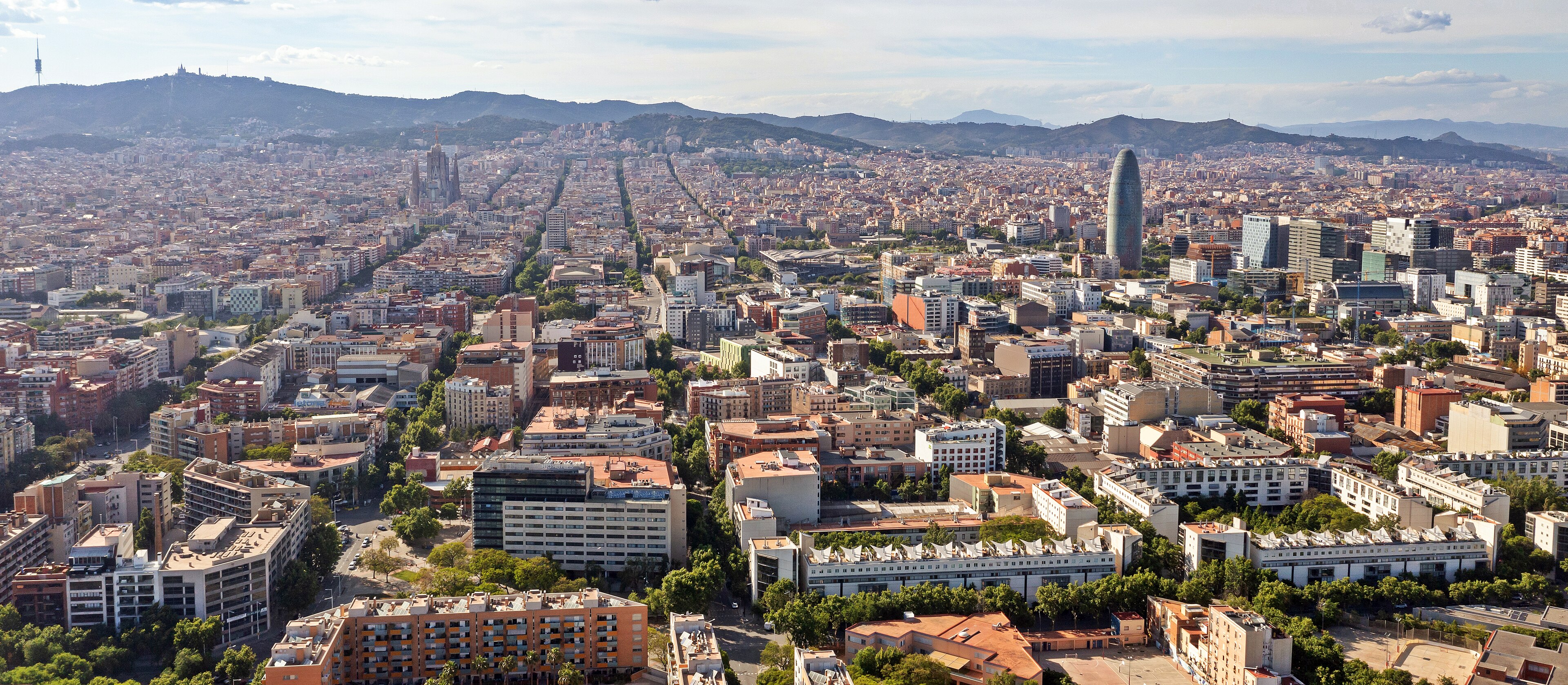 Aerial view of Barcelona and the Mediterranean coast for the AI agency service area page