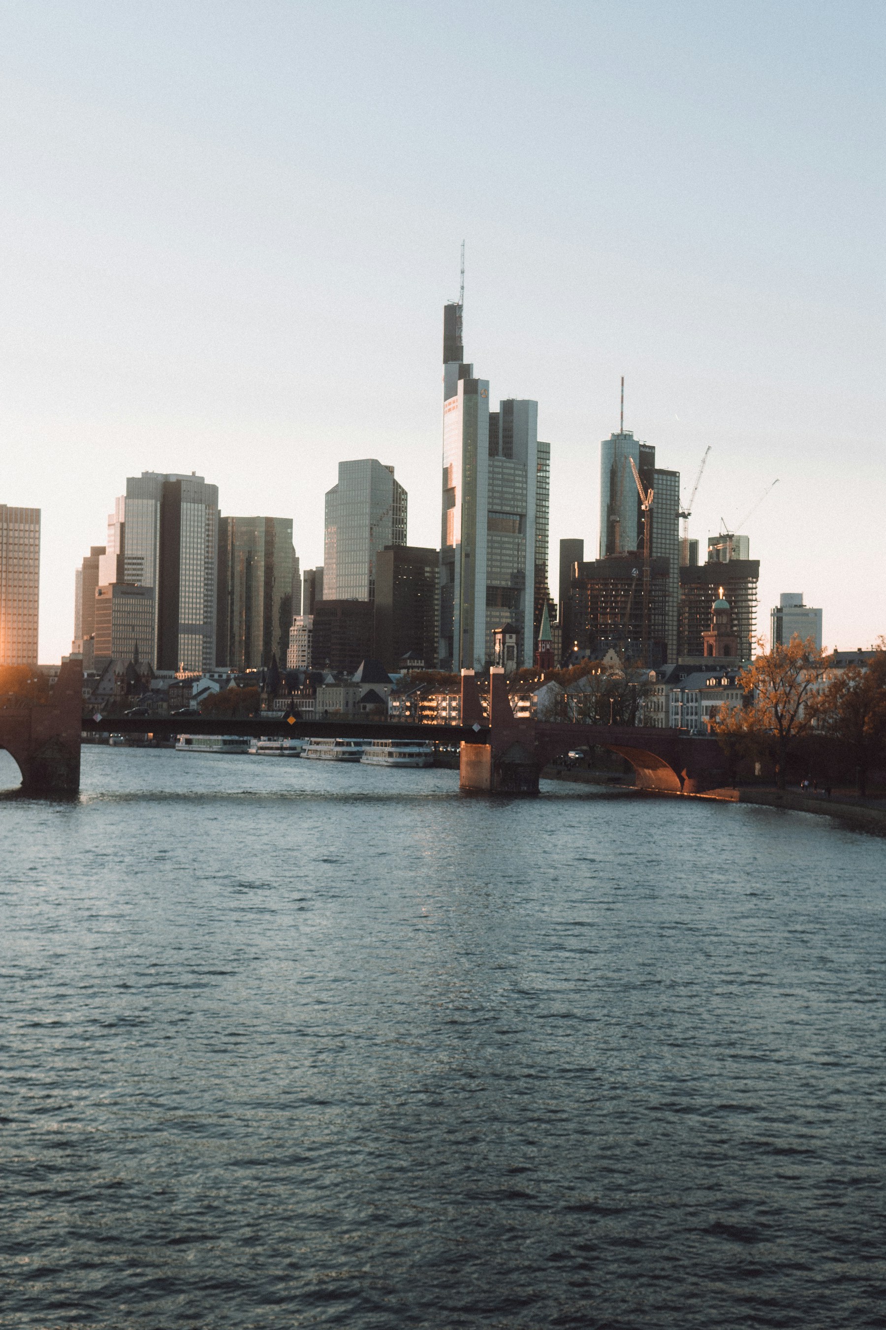 Frankfurt skyline photographed across the Main river for the AI agency service area page