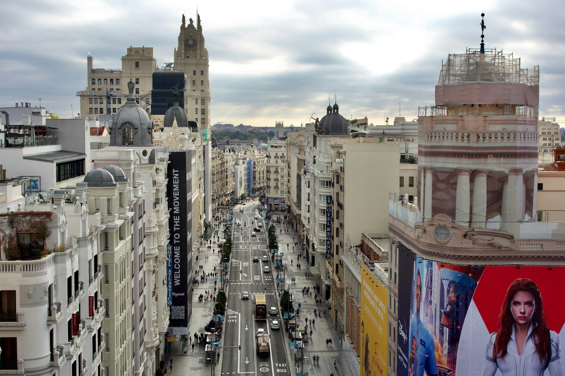 Madrid Gran Via photographed from above with city traffic and historic buildings