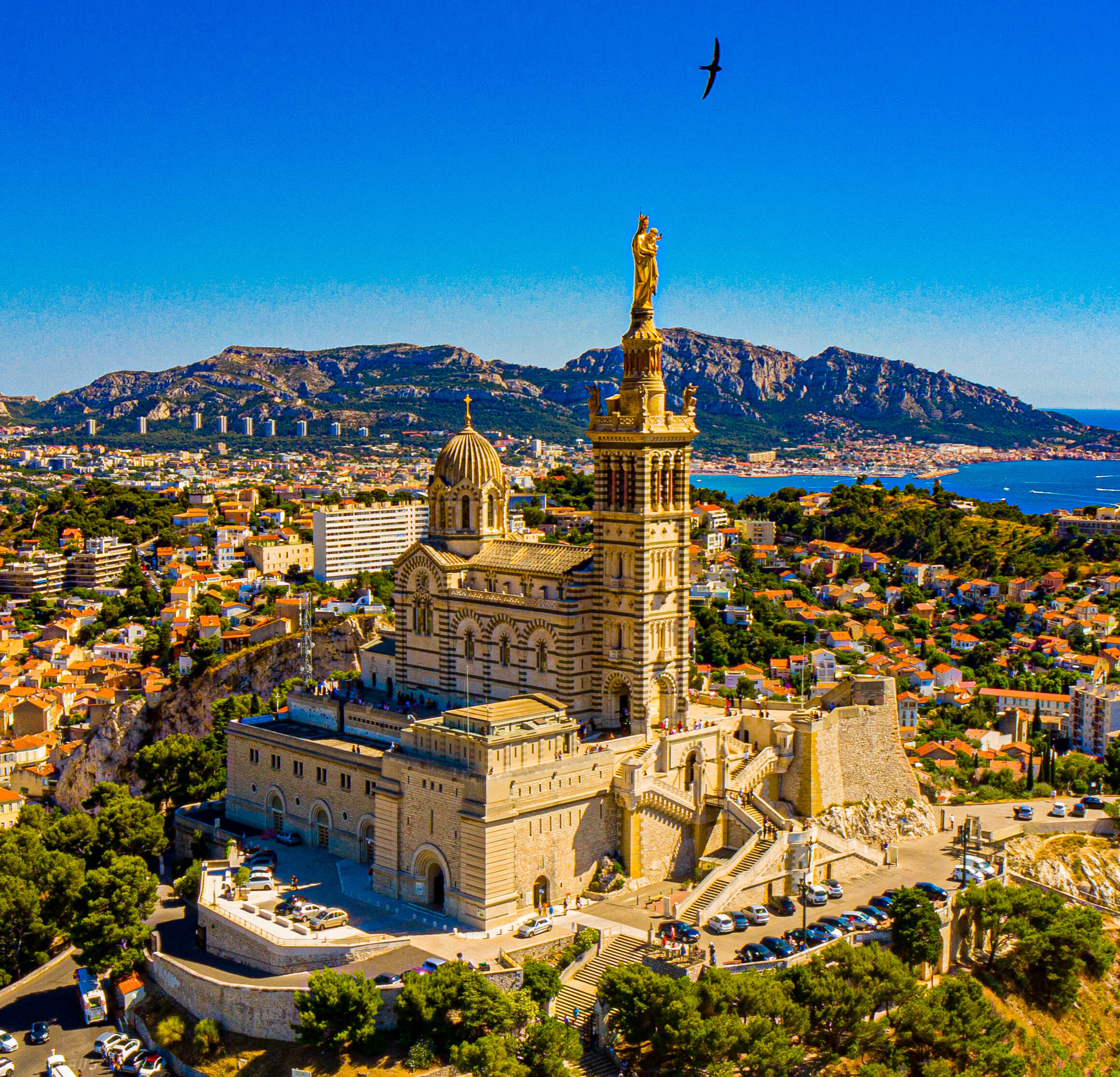 Aerial view of Notre-Dame de la Garde in Marseille for the AI agency service area page