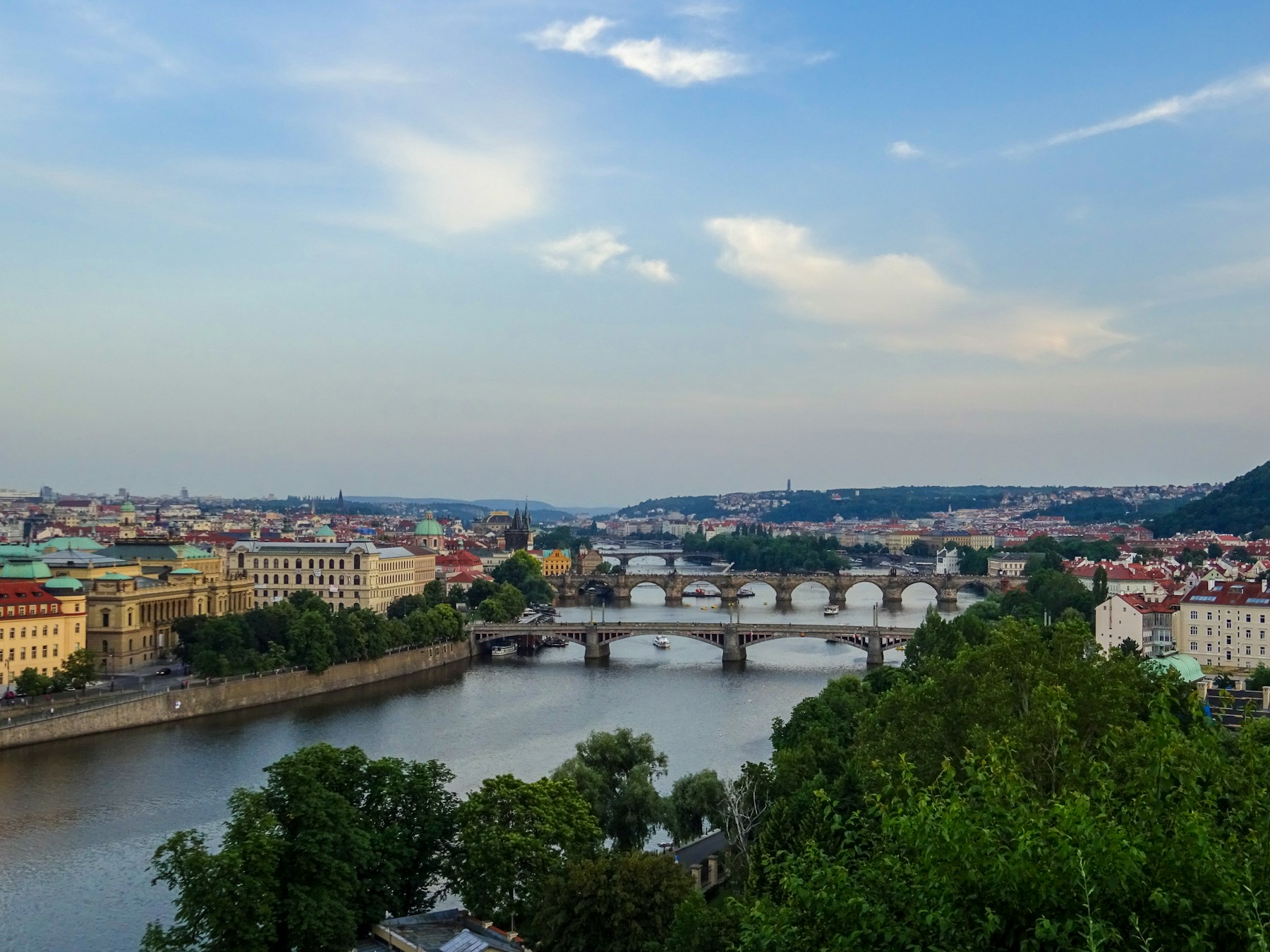 Prague city and river skyline photographed from above for the AI agency service area page
